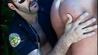 Butch and hairy cop gets sucked then plays with smooth naugty blonde hunk's ass