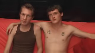 Dark-haired gay guy with a slim tattooed body enjoying a mind-blowing fuck