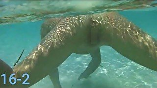 A Japanese wife swimming naked in the sea of an island.