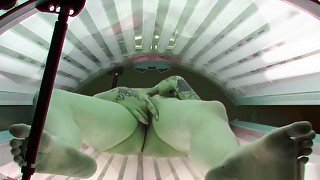 Punk Girl Secretly Masturbating In Solarium Tube