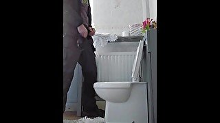 Pissing in a toilet