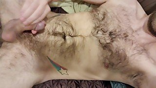 Hairy Otter with star tattoos blasts a huge load cumshot of jizz all the way to his face