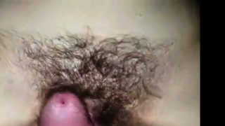 Pumping a load into my girl's hairy cunt