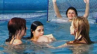 Three peppering young cuties demonstrate their cuddly bodies under water