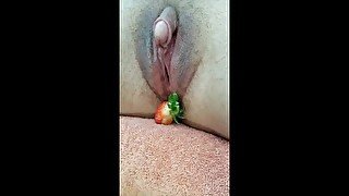 Pushing strawberries out of my tight pussy in greenhouse- BIG CLIT