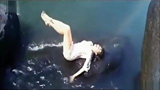 Wet Hot Indian Actress getting wet in sexy clothes in river