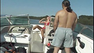 Tanned blonde is fucking on the boat