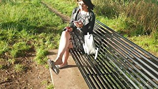 Tattooed Redheaded Girl Caught At The Bus Stop Dangling Her Shoe