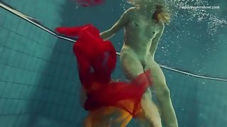 Skinny girl makes erotic underwater art