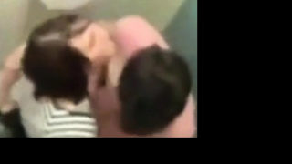 College couple caught fucking in the restrooms