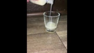 dipping my dick into a shot glass full of my own cum that I froze and thawed 1