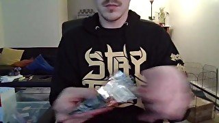 Nerd Opening a Pack of Trading Cards