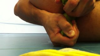 Man masturbating with vegetables and cums on himself