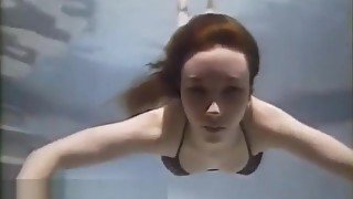 Sexy Young Redhead Angel in Pool