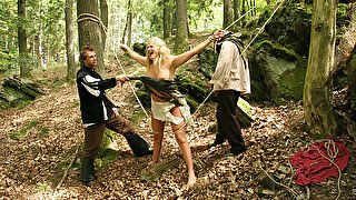 Blonde Witch Magda Endures BDSM Gang Bang & Outdoor Flogging