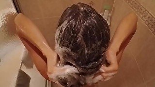 Washing my hair in the shower with closeup and slow motion shots