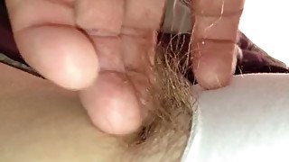 I just love playing with her long pubic hair through her pantie and rub her twat