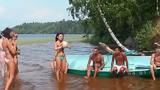 Three chicks are getting wet in the sea