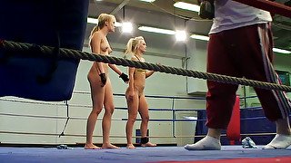 Two chicks get from ferocious mood to horny on the ring