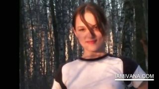 Sweet Ivana takes of undies in snowy woods