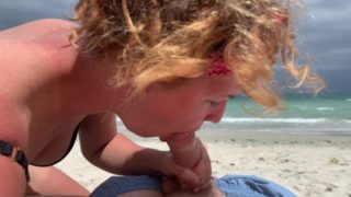 Deep blowjob on the beach, girl in bikini sucking cock, cum mouth outdoors