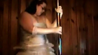 Chubby girl stripping in a white dress