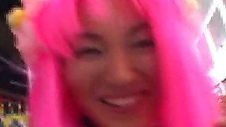 Pink haired Asian sweetie Kao Sugimori masturbates on the front seat of taxi car