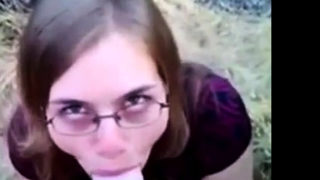 Nerdy Chick Sucks A Big White Dick In The Great Outdoors