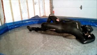 Wet gasmasked Orca frogman humps and struggles with another frogman