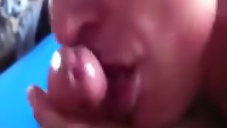 Chick licks his dick all over