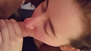 Teasing teen gives blowjob