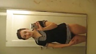 Teen self shot in front of mirror