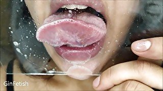 Glass kissing, licking and spitting