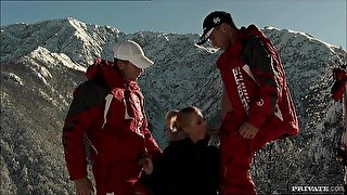 Two Ski Patrol Members Shove Their Way Into The Holes O