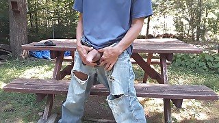 Wank's jeans edging on picnic table #4