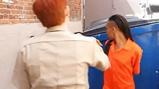 Beautiful ebony prisoner seduces redhead guard for steamy sex