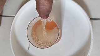 Piss into a cup of shaved ice