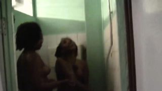 Nelly and Natasha strip and go under shower together. They