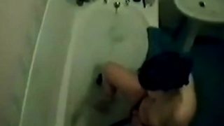 Masturbating in the bath, hidden camera