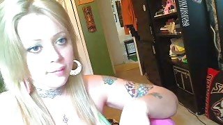 Really cute blonde sweetie shows her necklace but I see boobs