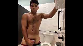 Horny teen masturbates in public bathroom when someone walks in