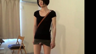 crossdresser wearing a mini skirt