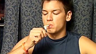 Deviant young smoker solo strokes until unleashing jizz