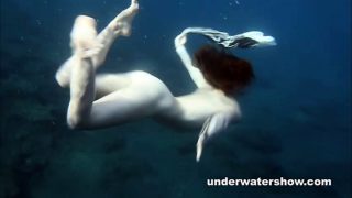 Nastya swimming nude in the sea