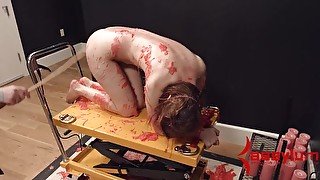 Pig slut covered in hot wax and beaten by her masters