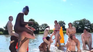 Interracial Nudists Playing Games In River Voyeur