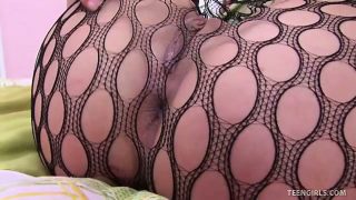 Gorgeous teen shows her magnificent ass in a tight body stocking