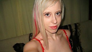 Cute-looking blonde Teena stimulates her wet hole on the cam