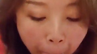 Cute asian wife sucks big cock and gets cum on her face