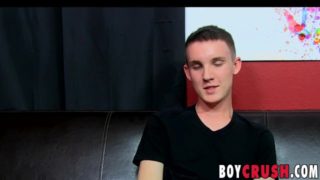 Solo twink working on his big fat cock during an interview